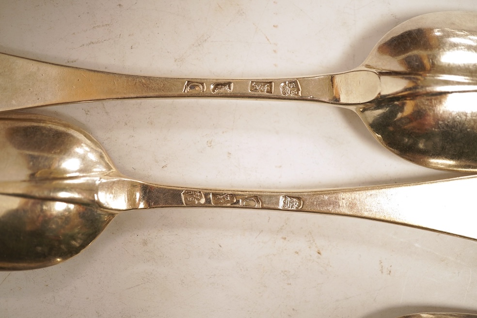 An 18th century Irish? provincial silver Hanoverian pattern tablespoon, maker's mark stamped twice 'I.T with crown above and mullet below' and 'Sterling', 20.9cm, together with eight assorted 18th century silver rat tail
